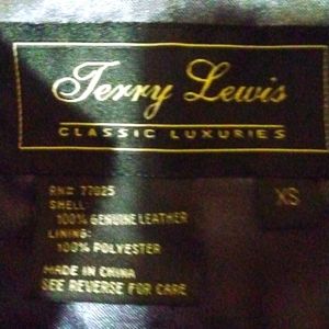 Blue leather jacket with gold zipper,